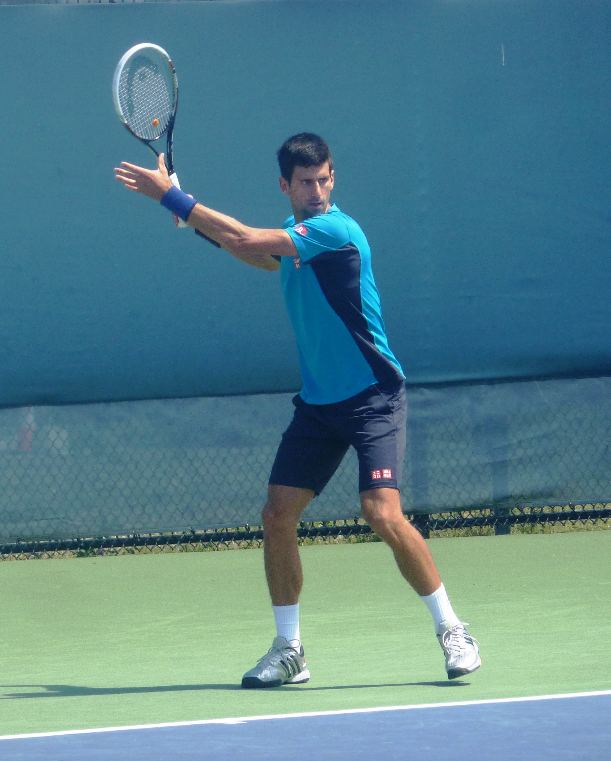 Djokovic warming up for his match